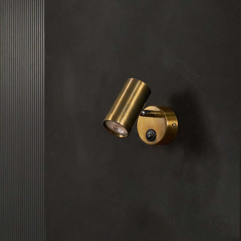 Antique Brass Finished LED Wall Lamp Light Off Black Background