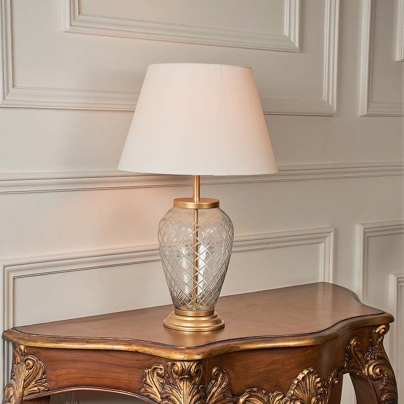Diamond Cut Antique Brass Finish Glass Table Lamp with Off White Shade - Large Light On White Background