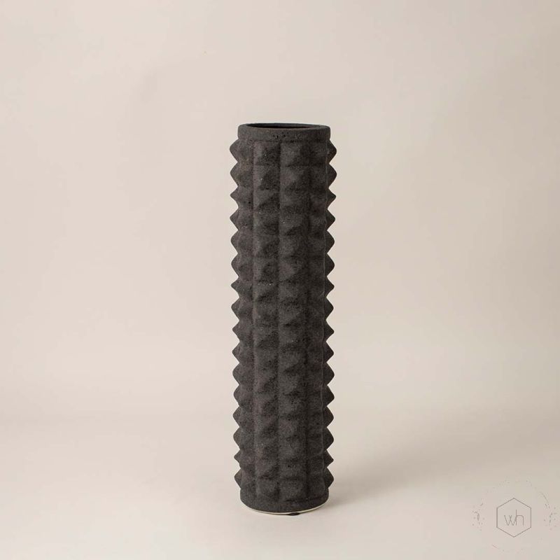 Doted Long Black Ceramic Vase White Background