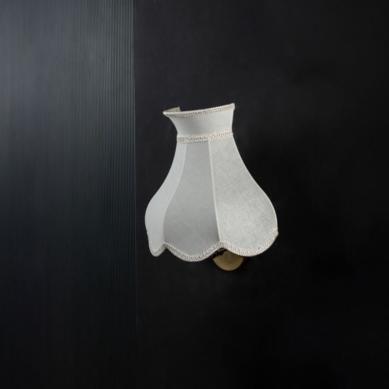 Elegant Ivory Half Shade Wall Sconce Light Off Black Background