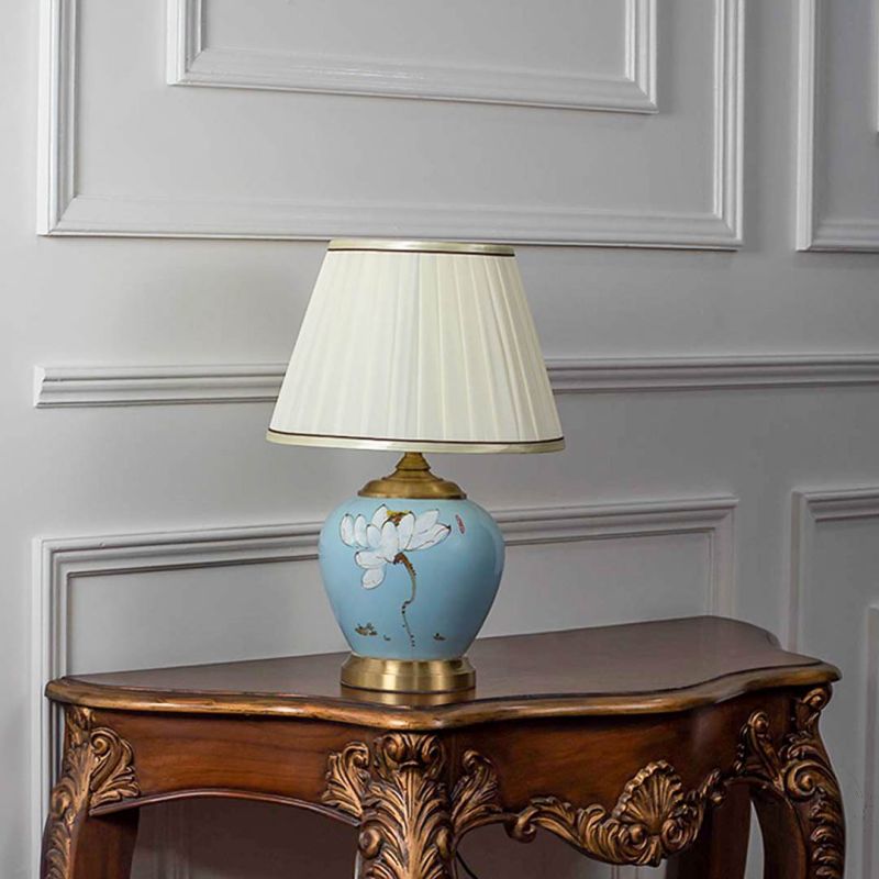 Elicia Sky Blue Ceramic Table Lamp with White Shade Light Off White Background