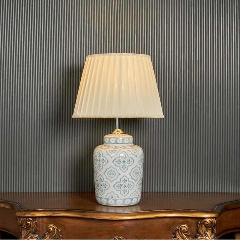 Grey Wash American Style White Ceramic Lamp with Ivory Shade Light On Black Background