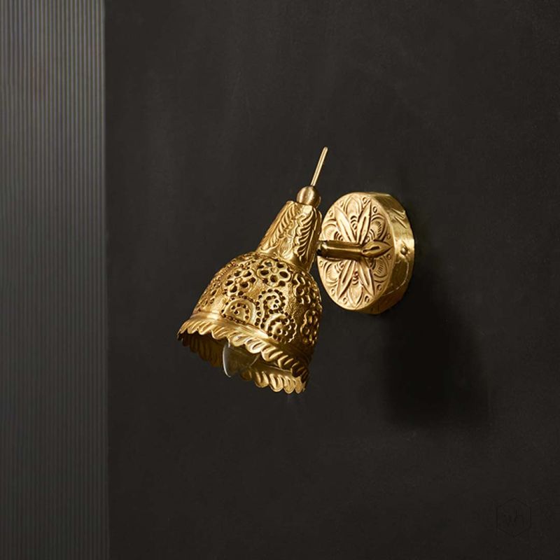 Hand tooled Single Brass Spot Light Light Off Black Background