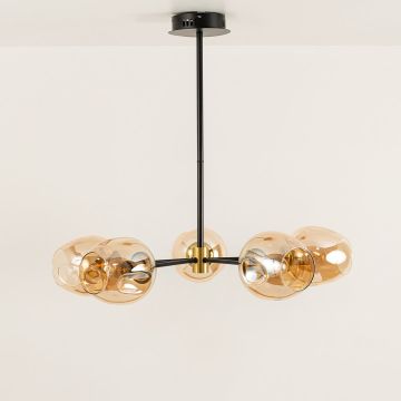 Amber glass globes chandelier displayed on white background with light off highlighting its sophisticated metallic details and design symmetry.