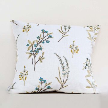 Floral embroidered cushion displayed on a white background showing detailed stitching and soft fabric texture giving a clean simple and elegant look suitable for modern decor.
