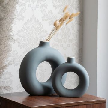 Modern ceramic vase set with pampas grass styled on wooden table for elegant living room and bedroom decor.