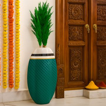 Green pampas grass decor placed in vase for stylish living space and contemporary home decoration.