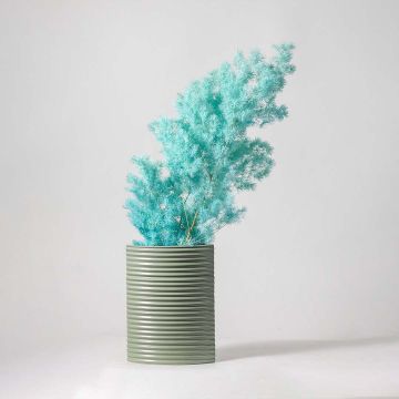 Turquoise preserved foliage bouquet styled in ribbed green ceramic vase lifestyle decor for modern home interiors.