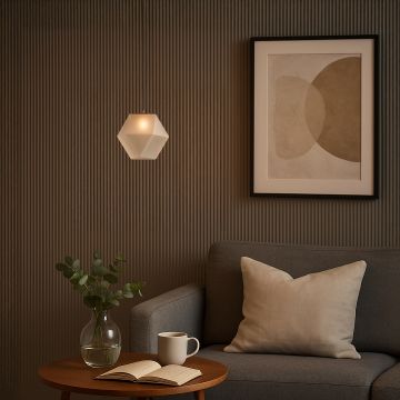 Frosted geometric pendant light on creating a warm glow in a modern living room with wooden table grey sofa and soft neutral decor for cozy ambience.