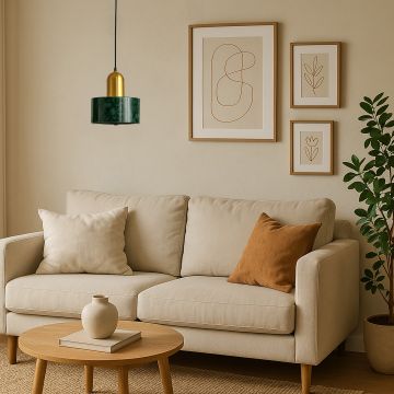 Elegant green marble and gold metal pendant light hanging in modern living room interior creating a stylish lifestyle look.