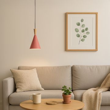 Contemporary cone pendant light with wooden detail illuminating cozy living room with sofa wall art and coffee table.