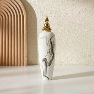 White ceramic decorative floor vase with black marble swirl design and gold lid perfect for living room corner and luxury home decor.