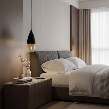 Lifestyle image of black metal pendant light hanging beside bed adding soft ambient glow and elegant lighting to modern bedroom space.