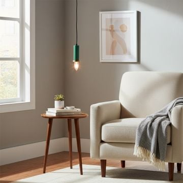 long chic pendant light green main lifestyle