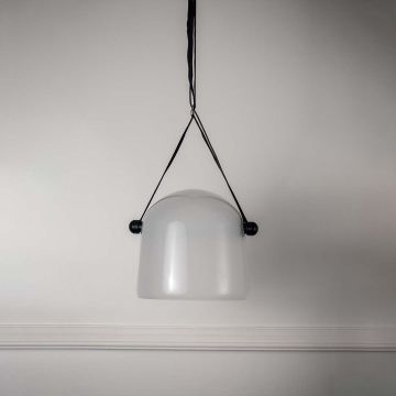 Blue ceramic vase with golden rim in floral paisley pattern styled as decorative accent for elegant modern home interiors.