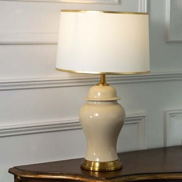 ClosetMix Ceramic Table Lamp With Golden Shade Light On White Background
