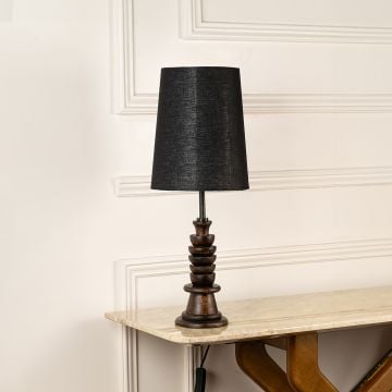 Dark wooden table lamp with tall black shade shown switched off on a clean white background highlighting its elegant modern silhouette ideal for interior decor settings.
