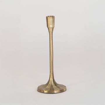 Brushed gold candle holder with tall design shown in natural room setting without white background for styled look