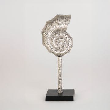 Decorative silver shell sculpture with spiral form and black base clearly displayed on plain white background