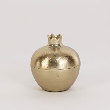Mini gold pomegranate jar shown in room setup without white background adding subtle accent to home decor styling