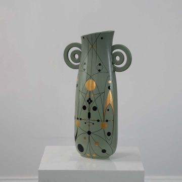 Green ceramic vase with abstract gold and black detailing and loop handles displayed on a clean white background for modern decor.