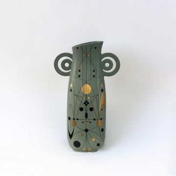 Artistic green ceramic vase featuring bold abstract patterns and loop handles shown on a plain white background for elegant styling.