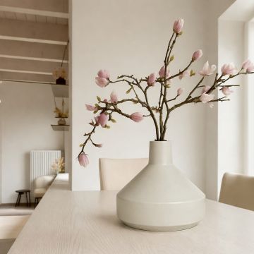 Minimal beige ceramic decorative vase with modern geometric shape perfect for dried flower display on console table shelf and home decor.