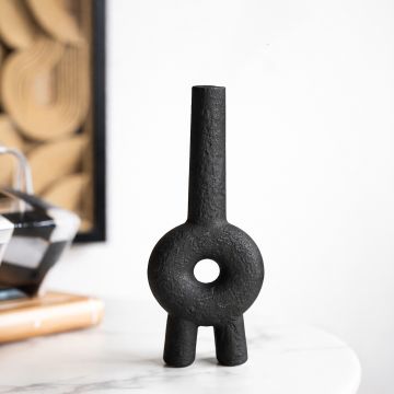 Black ceramic sculptural decorative vase with modern abstract form perfect for dried flower display on console table and stylish home decor.
