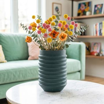 Green ceramic textured decorative vase with ribbed design perfect for dried flower display on console table shelf and modern home decor.