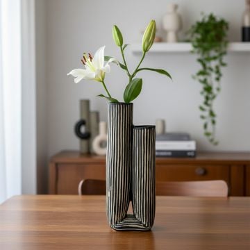 black white striped linear ceramic vase main lifestyle