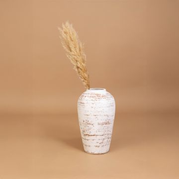 White rustic tall vase placed in a curated home setting enhancing consoles shelves and living spaces with natural artistic decorative appeal.