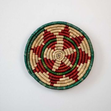 The Nyla Handwoven Sabai Grass Hanging Wall Basket Red Green White Background
