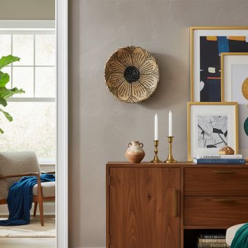 evander handwoven sabai grass hanging wall basket black main lifestyle