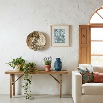 evita handwoven sabai grass hanging wall basket white black main lifestyle