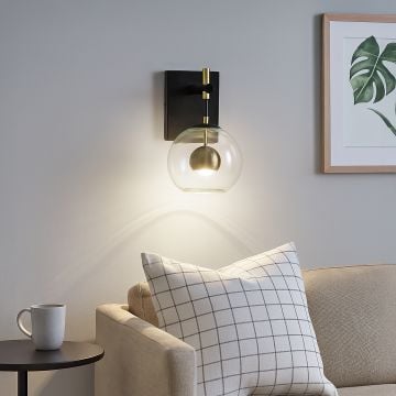 nucleus led wall sconce black main lifestyle