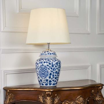 Floral Motif Chinese Porcelain Jar Style Blue Ceramic Table Lamp with White Shade Light On White Background