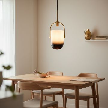 Black and gold pendant light turned off with sleek gradient glass shade and golden arch support displayed on a white background.