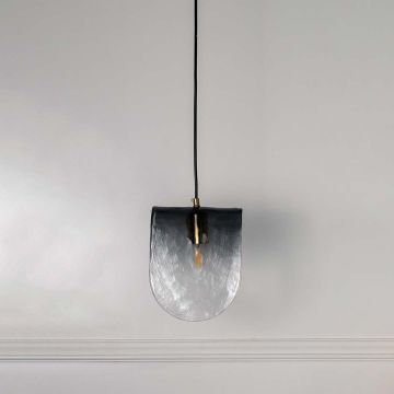 Black rectangular wall lantern with clear glass panels and exposed bulb shown off on white background for modern home decor.