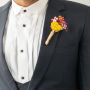 Groom boutonniere featuring yellow artificial flower with pink orange purple dried blooms and jute wrap on black background.