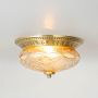 Brass and glass flush mount ceiling light with vintage cut design ideal for hallway or living room lighting fixture.