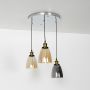 retro 3 light round glass cluster light with gold ceiling plate light off white background