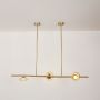 ceto 3 light linear chandelier amber light on white background