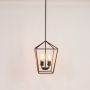urban loft 4 light geometric iron chandelier brown light on white background