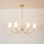 lottie 4 light linear chandelier gold light on white background