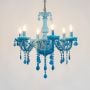 bezel 6 light victorian candle chandelier blue light on white background