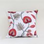 Soft cotton cushion cover with large red floral embroidery displayed in front view offering a striking nature inspired décor accent with a breathable gentle and skin friendly material.