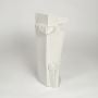 White ceramic decorative floor vase with artistic sculpted design for contemporary home decor display.