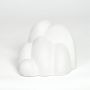 White ceramic decorative cloud sculpture with layered texture for contemporary home decor display.