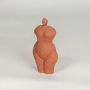 sculpted muse decorative object orange white background 1