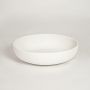 White ceramic decorative bowl with smooth matte finish perfect for modern living room console table or dining decor styling.